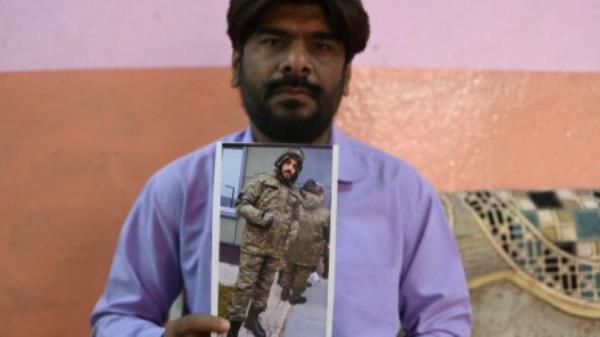 In this photo taken on February 22, 2024, Mohammed Imran shows his brother Mohammed Asfan image who was stranded in Russia along the war torn Ukraine border, at their home in Hyderabad. An apple farmer, an airline caterer and an out-of-work graduate are among the Indian natio<em></em>nals hired by Moscow, with the help of recruiters around the world, for the Russian Army in Ukraine.(AFP file)